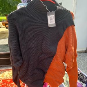 south moon partially opened sweater never worn